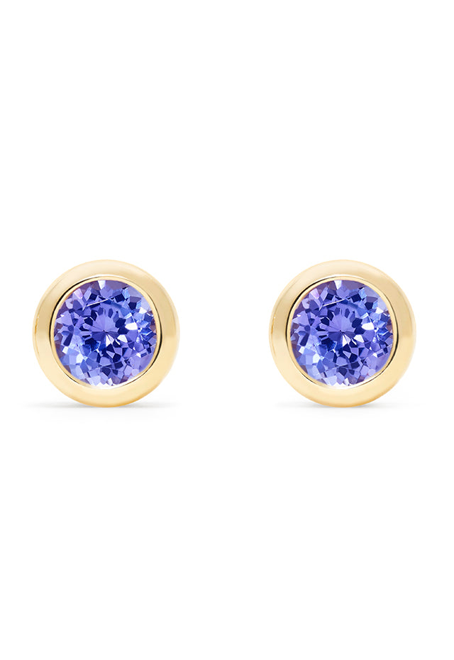 A pair of 14K Yellow Gold Tanzanite Stud Earrings, 0.91 TCW, with round faceted stones in classic bezel settings, shown on a white background.