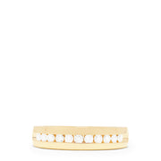 A modern, elegant Mens 14K Yellow Gold Diamond Ring featuring a row of nine round white diamonds (0.49 TCW) channel set across the front, with a smooth polished finish—timeless style by Effy.