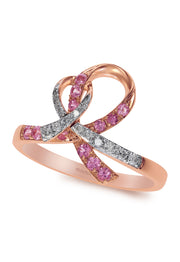 The 14K Rose Gold Pink Sapphire and Diamond Breast Cancer Awareness Ribbon Ring (0.38 TCW) features a ribbon-shaped band with pink sapphires and diamonds, symbolizing support with elegant rose gold craftsmanship.