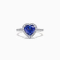 The Nahla Siri 14K White Gold Tanzanite and Diamond Heart Ring, 2.38 TCW, features a heart-shaped blue tanzanite center surrounded by a halo of diamonds and additional diamonds set along the band.