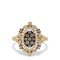 The 14K Yellow Gold Espresso and White Diamond Ring, 0.64 TCW, features a cluster of brown diamonds in an oval halo of white diamonds with band accents and intricate filigree detailing.