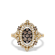 The 14K Yellow Gold Espresso and White Diamond Ring, 0.64 TCW, features a cluster of brown diamonds in an oval halo of white diamonds with band accents and intricate filigree detailing.