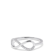 The Novelty 14K White Gold Diamond Infinity Ring, 0.06 TCW, features an elegant infinity symbol with sparkling diamonds and is displayed on a plain white background. An exquisite piece from the Effy Novelty collection.