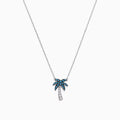 The Novelty 14K Gold Blue & White Diamond Palm Tree Necklace, 0.25 TCW, features sparkling gemstones on the leaves and trunk, beautifully displayed against a plain white background.