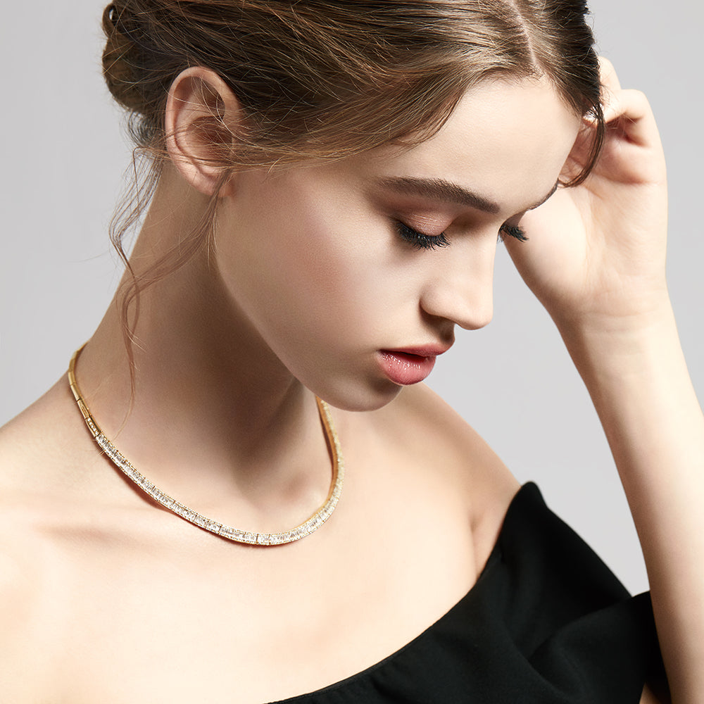 The DOro 14K Yellow Gold and Diamond Collar Necklace 3.12 TCW features a choker-style gold band adorned with a continuous row of sparkling diamonds along the front, showcased against a white background.