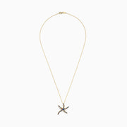 The Watercolors 14K Yellow Gold Multi Sapphire Starfish Pendant (0.80 TCW) features a starfish design accented with vibrant multicolored sapphires on a yellow gold chain.