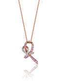 The 14K Rose Gold Pink Sapphire and Diamond Breast Cancer Awareness Ribbon Pendant (0.31 TCW) features a ribbon-shaped design adorned with pink sapphires and diamonds, symbolizing breast cancer awareness, on a white background.