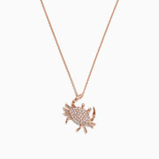 The Seaside 14K Yellow Gold Pave Diamond Crab Pendant (0.21 TCW) features a crab with sparkling diamonds and detailed legs, hanging from a fine gold chain, shown on a white background.