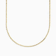 The 14K Yellow Gold 20 Woven Chain is displayed on a plain white background, featuring a gentle curve that accentuates its elegant twisted design.