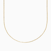 The 14K Yellow Gold Twisted Rope Chain is displayed against a plain white background, gently curving at the center.