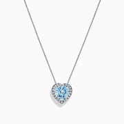 A 14K white gold pendant featuring a heart-shaped aquamarine surrounded by diamonds (2.90 TCW), displayed against a white background.