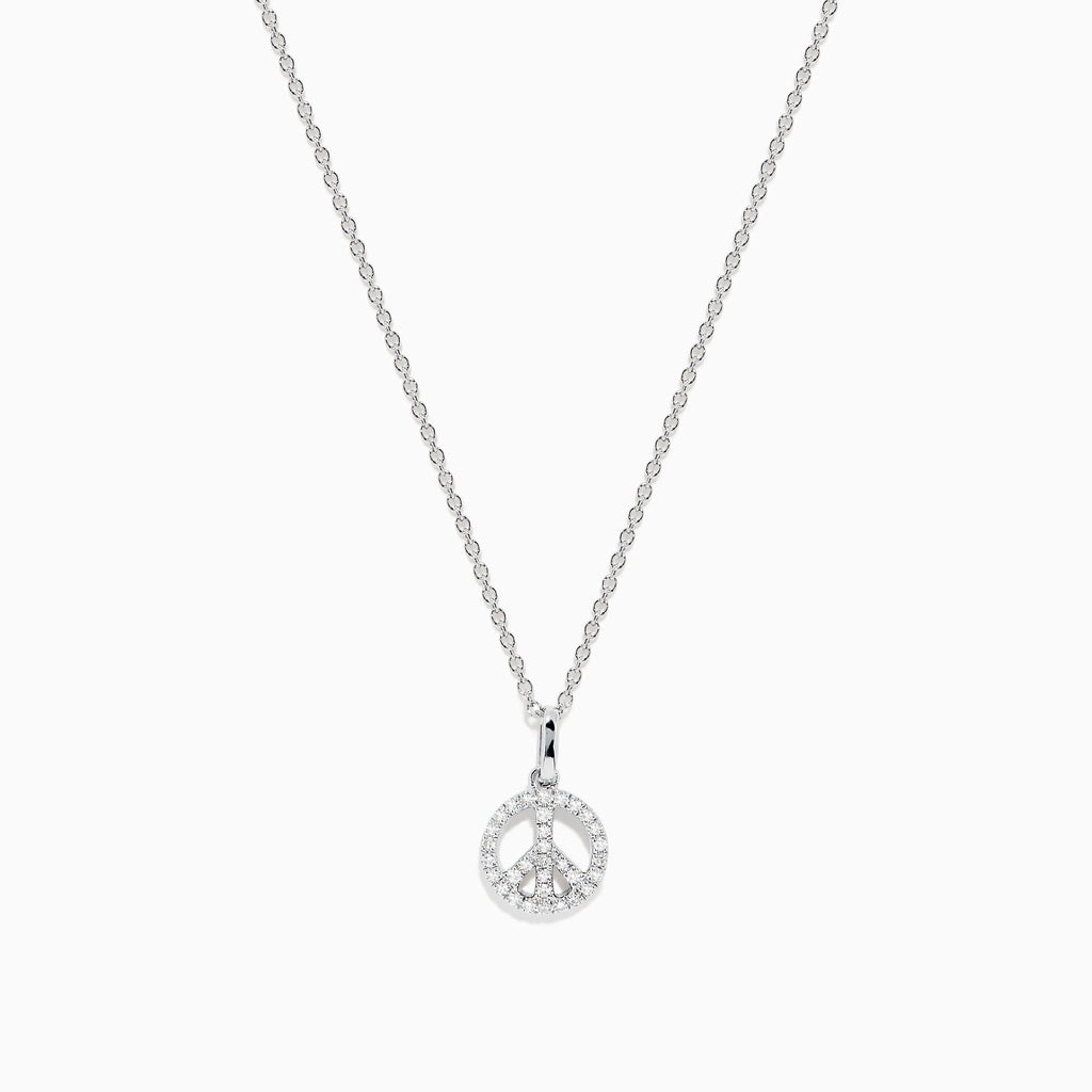 The 925 Sterling Silver Diamond Peace Sign Necklace features a delicate chain with a small, round pendant encrusted with clear, sparkling gemstones in the shape of a peace sign.