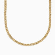 A close-up of the 14K Yellow Gold 18 Oval Beads Necklace, featuring polished oval beads, displayed in a U-shape against a white background.