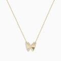 The 14K Yellow Gold Ribbed Butterfly Necklace features a delicate gold chain with a textured butterfly pendant, elegantly showcased against a plain white background.
