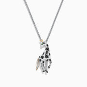 The Safari Sterling Silver Black Diamond Giraffe Pendant (0.13 TCW) features black spots, a green eye, and a gold-accented tail—part of the Effy Safari collection.