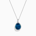 The Ocean Bleu 14K Gold London Blue Topaz and Diamond Pendant, 9.45 TCW, features a teardrop-shaped blue topaz surrounded by sparkling diamonds, shown on a plain white background.