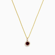 The Bordeaux 14K Yellow Gold Garnet and Diamond Pendant (0.61 TCW) showcases a round garnet center with a diamond halo, elegantly displayed on a plain white background.