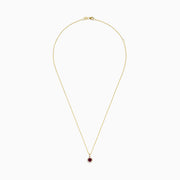 The Bordeaux 14K Yellow Gold Garnet and Diamond Pendant (0.61 TCW) showcases a round garnet center with a diamond halo, elegantly displayed on a plain white background.