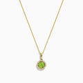 A 14K yellow gold peridot and diamond pendant (1.10 TCW) with a round peridot center, surrounded by sparkling diamonds, shown on a white background.