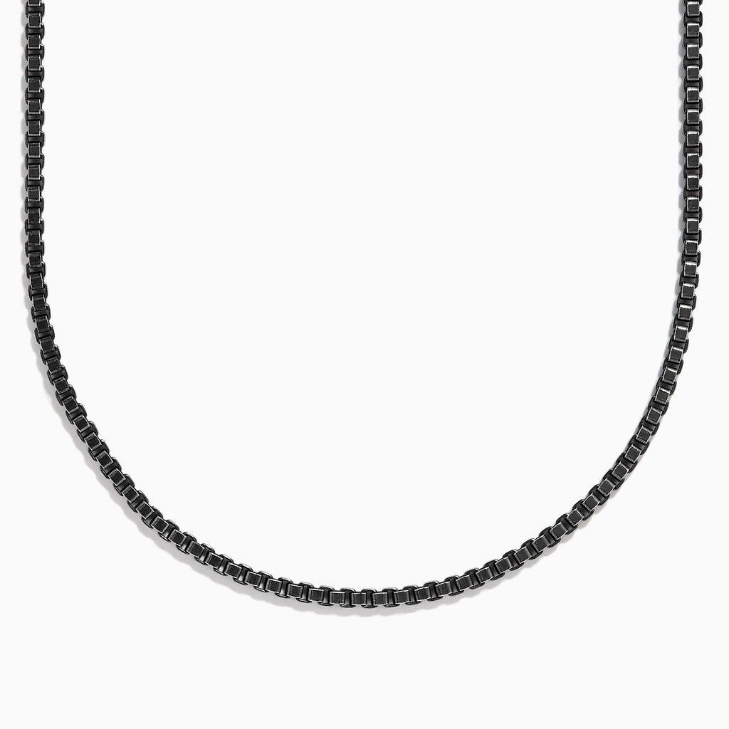 The Mens 925 Sterling Silver Black Rhodium Box Chain Necklace is shown on a white background, with only the lower half of its elegantly curved black rhodium finish visible.