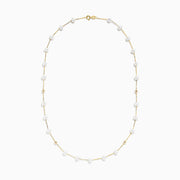 The 14K Yellow Gold Freshwater Pearl Necklace features small white pearls and gold beads arranged alternately along a delicate yellow gold chain, offering a simple yet elegant design in classic Effy style.