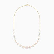 The 14K Yellow Gold Multi Color Pearl Necklace by Effy Jewelry features a delicate yellow gold chain adorned with alternating white and light pink pearls along the lower half, finished with a simple clasp.