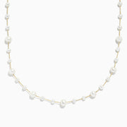 The 14K Yellow Gold Cultured Fresh Water Pearl Necklace by Effy features spaced irregular pearls on a delicate gold chain, shown on a white background.