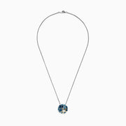 The Seaside Silver & 18K Gold Blue Topaz Starfish Pendant (4.90 TCW) features clustered gemstones and a small gold starfish accent on a silver chain necklace.