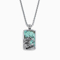 The Men’s Sterling Silver Turquoise Wave Pendant, 10.50 TCW, features a rectangular design with an engraved ocean wave and a vibrant turquoise stone background.