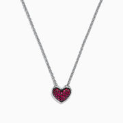 The 925 Sterling Silver Ruby Heart Pendant, 0.65 TCW, is featured on a simple white background, showcasing its ruby heart design with sparkling red gemstones.