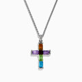 The Mosaic 925 Sterling Silver Multi Stone Cross Pendant features a sterling silver chain with a cross pendant adorned with rectangular orange, purple, green, and blue gemstones in a sleek silver frame.