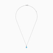 The Ocean Bleu 14K White Gold Blue Topaz Pendant, 1.00 TCW, features a single round blue topaz on a delicate white gold chain, showcased against a plain white background.