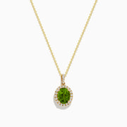 The 14K Yellow Gold Peridot and Diamond Pendant features a round peridot accented by sparkling diamonds, all set in yellow gold for a radiant look.