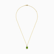 The 14K Yellow Gold Peridot and Diamond Pendant features a square-cut peridot gemstone and sparkling diamonds, set in yellow gold and shown against a white background.
