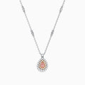 Elegant 18K gold necklace featuring a pinkish-brown certified diamond center, two rows of clear stones, and decorative chain links. Total carat weight: 0.70 TCW.