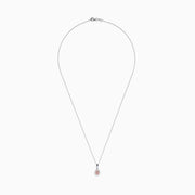 An 18K two-tone gold necklace featuring a pear-shaped pendant with pink and white diamonds (0.18 TCW) on a delicate chain. Set against a white background.