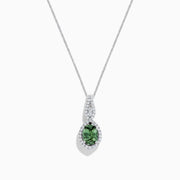 A 14K white gold pendant featuring a round green Tanzanite and diamonds (2.35 TCW) on a delicate chain, displayed on a white background.