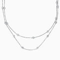 The 14K White Gold 36 Diamond Station Necklace features evenly spaced bezel-set round diamonds totaling 2.00 TCW along double-layered chains, shown on a plain white background.