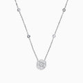 The 14K White Gold 18 Diamond Station and Flower Cluster Necklace (1.51 TCW) features a delicate flower cluster pendant and sparkling round diamonds along the chain, shown on a white background.