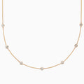 The DOro 14K Yellow Gold Diamond Station Necklace, 0.69 TCW, features a fine gold chain with evenly spaced bezel-set round diamonds for a delicate and elegant look.