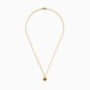 The Ruby Royale 14K Yellow Gold Ruby Heart Lock Necklace features elongated links and a heart-shaped padlock pendant set with a central ruby gemstone.