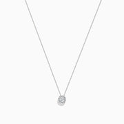 A delicate 14k White Gold Diamond pendant (0.20 TCW) necklace, elegantly displayed against a white background.