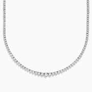 The 14K White Gold Diamond Tennis Necklace 2.94 TCW features a row of round diamonds set closely together in a delicate, elegant design.
