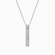 The Classique 14K White Gold Diamond Vertical Necklace, 0.61 TCW, showcases a sleek white gold chain and a vertical rectangular pendant adorned with a row of brilliant diamonds down the center.