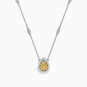 The Canare 18K Two-Tone Gold Yellow and White Diamond Necklace (0.69 TCW) features a teardrop pendant with a yellow gemstone encircled by white diamonds, set on a gold chain accented with spaced round gemstones.