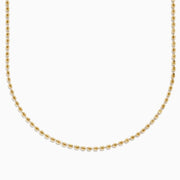 The 14K Yellow Gold Bead Necklace features evenly spaced, small spherical beads on a delicate chain, shown against a white background for a simple, elegant look.
