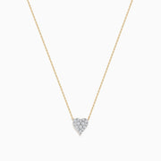 The 14K Yellow Gold Diamond Heart Necklace features a delicate gold chain with a small, diamond-encrusted heart pendant, centered on the necklace and displayed against a white background.