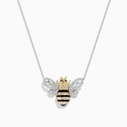 A captivating 14K White Gold White and Black Diamond Bee Necklace, showcasing a bee-shaped pendant adorned with sparkling white and black diamonds atop a delicate chain.