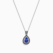 A 14K gold Nahla Siri pendant with a teardrop-shaped tanzanite center, 1.22 TCW, surrounded by sparkling diamonds.