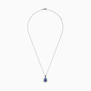 A 14K gold Nahla Siri pendant with a teardrop-shaped tanzanite center, 1.22 TCW, surrounded by sparkling diamonds.